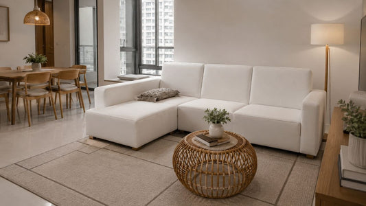 White L-shape sofa in a coordinated BTO living and dining room with warm neutral furniture for a complete-home bundle