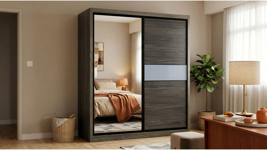 Dark wood sliding wardrobe with mirrored door in a warm modern Singapore bedroom with soft lighting