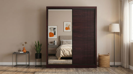 Dark wood sliding wardrobe with mirrored panel for vertical bedroom storage in a modern Singapore HDB room