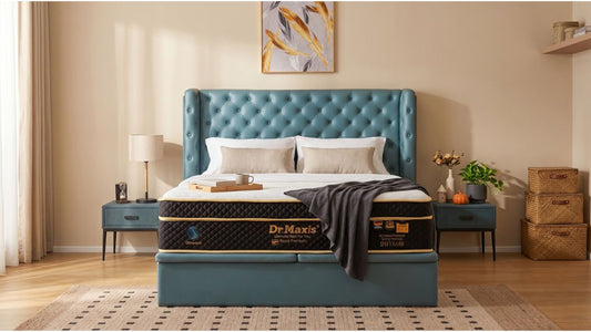 Dr Maxis mattress on teal tufted bed frame in a modern Singapore bedroom, styled for mattress firmness and body support guidance