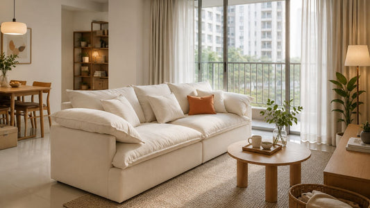 Cream sofa in a Singapore HDB living room showing a practical furniture sequence for moving into a new home