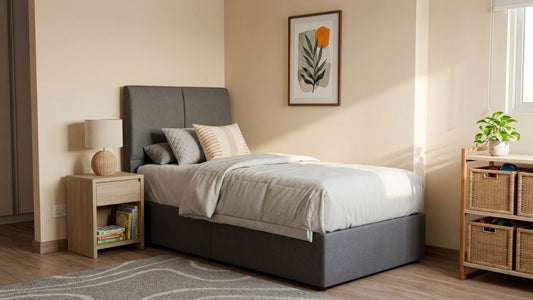 Grey single bed frame for children’s room in a modern Singapore HDB bedroom with bedside table and storage baskets