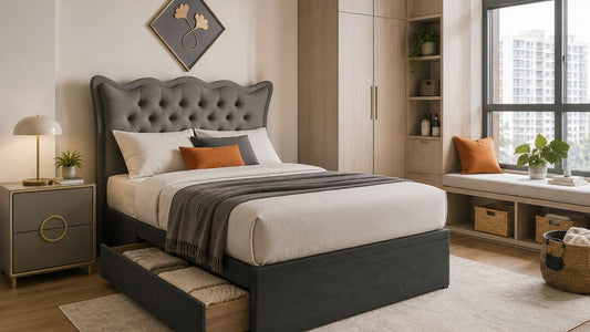 Grey upholstered storage bed frame with open drawer in a modern Singapore bedroom with built-in wardrobe and window storage bench.