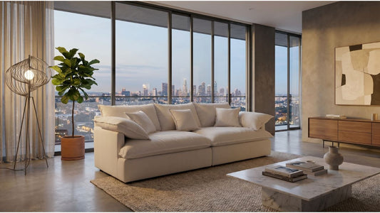 Large Singapore condo living room with white sectional sofa, city view, marble coffee table, and warm neutral styling