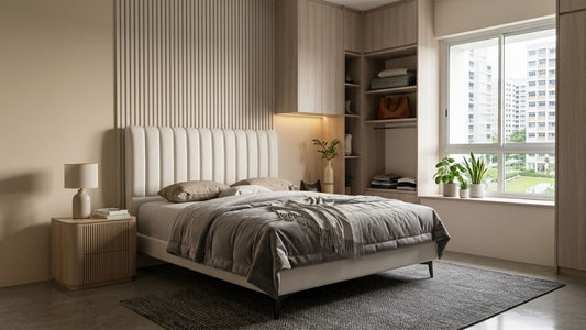 Modern outdoor-inspired bedroom setup with durable neutral furnishings, textured rug, upholstered bed frame, and balcony seating designed for long-lasting comfort in Singapore homes