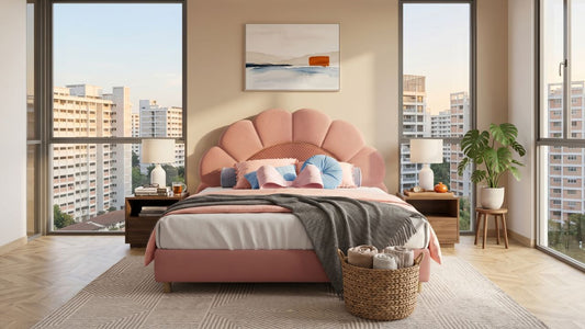 Pink scallop headboard bed frame in a bright Singapore bedroom with HDB view, bedside tables, woven storage basket, and soft modern styling