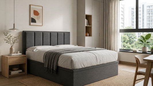 Quality mattress in a modern Singapore bedroom showing a sturdy grey upholstered bed and supportive mattress setup