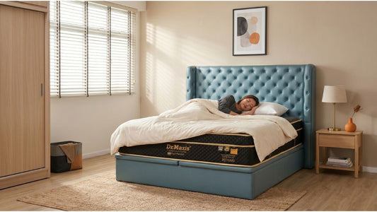 Streamlined tight-top mattress in a cosy Singapore bedroom with teal bed frame, wood bedside table, and resident sleeping