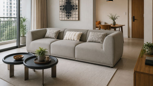 Light grey deep-seat sofa in a modern Singapore condo living room, showing why sofa depth matters for comfort, layout, and everyday use.