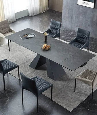 Dining room with multiple chairs and table.